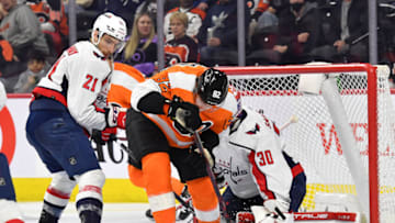 Feb 17, 2022; Philadelphia, Pennsylvania, USA; Philadelphia Flyers center Connor Bunnaman (82) looks for the rebound against Washington Capitals right wing Garnet Hathaway (21) and goaltender Ilya Samsonov (30) during the second period at Wells Fargo Center. Mandatory Credit: Eric Hartline-USA TODAY Sports