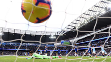 MANCHESTER, ENGLAND - FEBRUARY 10: Ilkay Gundogan of Manchester City scores his team's fourth goal past Kepa Arrizabalaga of Chelsea during the Premier League match between Manchester City and Chelsea FC at Etihad Stadium on February 10, 2019 in Manchester, United Kingdom. (Photo by Laurence Griffiths/Getty Images)