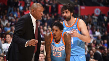 LOS ANGELES, CA - MARCH 6: Head Coach Doc Rivers of the LA Clippers speaks to Lou Williams #23 of the LA Clippers and Milos Teodosic #4 of the LA Clippers during the game against the New Orleans Pelicans on March 6, 2018 at STAPLES Center in Los Angeles, California. NOTE TO USER: User expressly acknowledges and agrees that, by downloading and/or using this Photograph, user is consenting to the terms and conditions of the Getty Images License Agreement. Mandatory Copyright Notice: Copyright 2018 NBAE (Photo by Andrew D. Bernstein/NBAE via Getty Images)