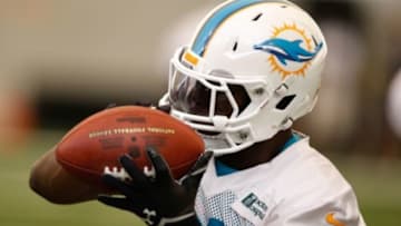 Jun 17, 2014; Davie, FL, USA; Miami Dolphins running back Knowshon Moreno catches a pass during mini-camp at Miami Dolphins Training Facility. Mandatory Credit: Robert Mayer-USA TODAY Sports