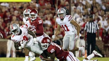 Sep 17, 2016; Norman, OK, USA; Oklahoma Sooners safety Steven Parker (10) tackles Ohio State Buckeyes running back Curtis Samuel (4) during the first half at Gaylord Family - Oklahoma Memorial Stadium. Mandatory Credit: Kevin Jairaj-USA TODAY Sports