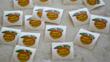 ATLANTA, GA - NOVEMBER 03: A pile of stickers for voters at Park Tavern on November 3, 2020 in Atlanta, Georgia. After a record-breaking early voting turnout, Americans head to the polls on the last day to cast their vote for incumbent U.S. President Donald Trump or Democratic nominee Joe Biden in the 2020 presidential election. (Photo by Megan Varner/Getty Images)