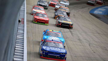 DOVER, DE - SEPTEMBER 30: Elliott Sadler, driver of the #1 OneMain Financial Chevrolet, leads a pack of cars during the NASCAR XFINITY Series "Use Your Melon. Drive Sober 200" at Dover International Speedway on September 30, 2017 in Dover, Delaware. (Photo by Chris Trotman/Getty Images)