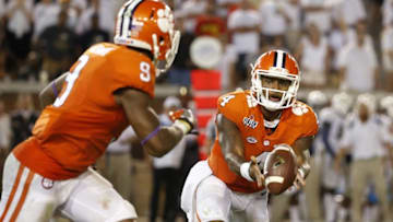 Sep 22, 2016; Atlanta, GA, USA; Clemson Tigers quarterback Deshaun Watson (4) pitches the ball to running back Wayne Gallman (9) in the fourth quarter of their game against the Georgia Tech Yellow Jackets at Bobby Dodd Stadium. The Tigers won 26-7. Mandatory Credit: Jason Getz-USA TODAY Sports