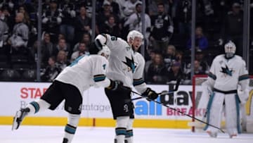 Apr 22, 2016; Los Angeles, CA, USA; San Jose Sharks center Nick Spaling (16) and defenseman Brenden Dillon (4) celebrate at the end of game five of the first round of the 2016 Stanley Cup Playoffs against the Los Angeles Kings at Staples Center. The Sharks defeated the Kings 6-3 to win the series 4-1. Mandatory Credit: Kirby Lee-USA TODAY Sports