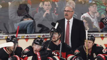 OTTAWA, ON - MARCH 16: Head coach Paul MacLean of the Ottawa Senators looks on from the bench against the Colorado Avalanche during an NHL game at Canadian Tire Centre on March 16, 2014 in Ottawa, Ontario, Canada. (Photo by Jana Chytilova/Freestyle Photography/Getty Images)