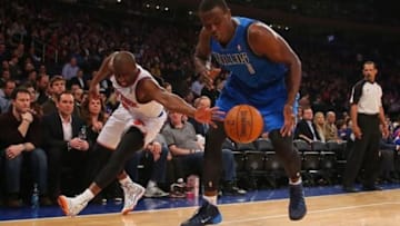 Feb 24, 2014; New York, NY, USA; New York Knicks point guard Raymond Felton (2) battles for the ball with Dallas Mavericks center Samuel Dalembert (1) during the third quarter at Madison Square Garden. Dallas Mavericks won 110-108. Mandatory Credit: Anthony Gruppuso-USA TODAY Sports
