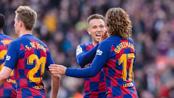 BARCELONA, SPAIN - FEBRUARY 15: Antoine Griezmann of FC Barcelona (R) celebrates his goal with Arthur Melo of FC Barcelona (L) during the Liga match between FC Barcelona and Getafe CF at Camp Nou on February 15, 2020 in Barcelona, Spain. (Photo by Claudio Chaves/Eurasia Sport Images/Getty Images)