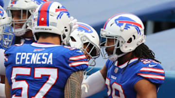 ORCHARD PARK, NEW YORK - JANUARY 03: Josh Norman #29 of the Buffalo Bills celebrates with A.J. Epenesa #57 after scoring a touchdown against the Miami Dolphins in the third quarter at Bills Stadium on January 03, 2021 in Orchard Park, New York. (Photo by Timothy T Ludwig/Getty Images)