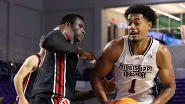 Nov 23, 2022; Fort Myers, Florida, USA; Mississippi State Bulldogs forward Tolu Smith (1) drives to the hoop past Utah Utes center Keba Keita (13) in the second half during the Fort Myers Tip-Off Beach Division championship game at Suncoast Credit Union Arena. Mandatory Credit: Nathan Ray Seebeck-USA TODAY Sports