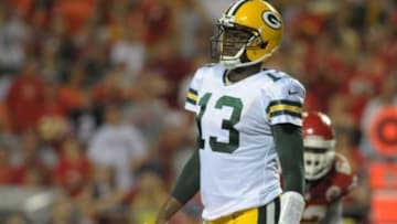 Aug 29, 2013; Kansas City, MO, USA; Green Bay Packers quarterback Vince Young (13) looks to the sidelines during the second half of the game against the Kansas City Chiefs at Arrowhead Stadium. The Chiefs won 30-8. Mandatory Credit: Denny Medley-USA TODAY Sports
