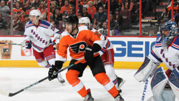 PHILADELPHIA, PA - JANUARY 04: Matt Read #24 of the Philadelphia Flyers positions himself on a scoring opportunity against Henrik Lundquvist #30 of the New York Rangers on January 4, 2017 at the Wells Fargo Center in Philadelphia, Pennsylvania. (Photo by Len Redkoles/NHLI via Getty Images)