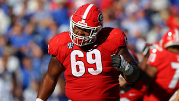 ATHENS, GA - OCTOBER 16: Jamaree Salyer #69 of the Georgia Bulldogs reacts after a touchdown is scored in the first half against the Kentucky Wildcats at Sanford Stadium on October 16, 2021 in Athens, Georgia. (Photo by Todd Kirkland/Getty Images)