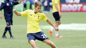 Jul 19, 2014; Seattle, WA, USA; Tottenham Hotspur midfielder Thomas Carroll (28) shoots a goal shot during pre game warm ups prior to the game against the Seattle Sounders FC at CenturyLink Field. Mandatory Credit: Steven Bisig-USA TODAY Sports