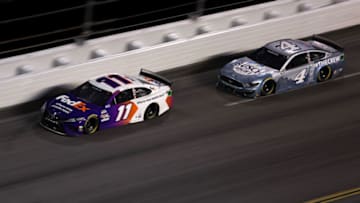 Denny Hamlin, Joe Gibbs Racing, and Kevin Harvick, Stewart-Haas Racing, NASCAR (Photo by James Gilbert/Getty Images)