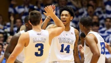 Jan 16, 2016; Durham, NC, USA; Duke Blue Devils guard Brandon Ingram (14) and guard Grayson Allen (3) celebrate a basket in their game against the Notre Dame Fighting Irish at Cameron Indoor Stadium. Mandatory Credit: Mark Dolejs-USA TODAY Sports
