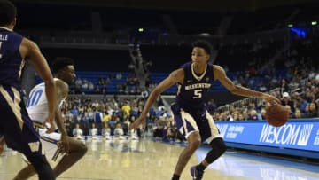 Jan 28, 2016; Los Angeles, CA, USA; Washington Huskies guard Dejounte Murray (5) handles the ball in the first half against the UCLA Bruins at Pauley Pavilion. Mandatory Credit: Richard Mackson-USA TODAY Sports
