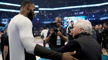 CHARLOTTE, NORTH CAROLINA - FEBRUARY 17: LeBron James #23 of the LA Lakers and Team LeBron greets Robert Kraft at halftime during the NBA All-Star game as part of the 2019 NBA All-Star Weekend at Spectrum Center on February 17, 2019 in Charlotte, North Carolina. NOTE TO USER: User expressly acknowledges and agrees that, by downloading and/or using this photograph, user is consenting to the terms and conditions of the Getty Images License Agreement. (Photo by Streeter Lecka/Getty Images)