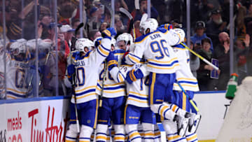 Apr 29, 2022; Buffalo, New York, USA; The Buffalo Sabres celebrate an overtime win against the Chicago Blackhawks at KeyBank Center. Mandatory Credit: Timothy T. Ludwig-USA TODAY Sports