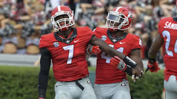 Sep 10, 2016; Athens, GA, USA; Georgia Bulldogs linebacker Lorenzo Carter (7) reacts with linebacker Chuks Amaechi (41) after returning a fumble for a touchdown against the Nicholls State Colonels during the second half at Sanford Stadium. Georgia defeated Nicholls State 26-24. Mandatory Credit: Dale Zanine-USA TODAY Sports