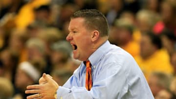 COLUMBIA, MO - JANUARY 05: Head coach Dave Paulsen of the Bucknell Bison reacts from the bench during the game against the Missouri Tigers at Mizzou Arena on January 5, 2013 in Columbia, Missouri. (Photo by Jamie Squire/Getty Images)