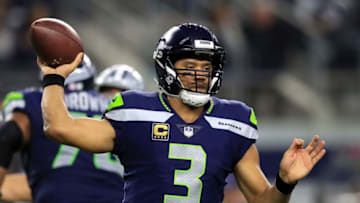 ARLINGTON, TX - DECEMBER 24: Russell Wilson #3 of the Seattle Seahawks throws against the Dallas Cowboys in the second half at AT&T Stadium on December 24, 2017 in Arlington, Texas. (Photo by Ronald Martinez/Getty Images)