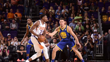 PHOENIX, AZ - APRIL 8: Danuel House Jr. #23 of the Phoenix Suns handles the ball against the Golden State Warriors on April 8, 2018 at Talking Stick Resort Arena in Phoenix, Arizona. NOTE TO USER: User expressly acknowledges and agrees that, by downloading and or using this photograph, user is consenting to the terms and conditions of the Getty Images License Agreement. Mandatory Copyright Notice: Copyright 2018 NBAE (Photo by Michael Gonzales/NBAE via Getty Images)