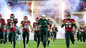 TROY, ALABAMA - NOVEMBER 2: head coach Jon Sumrall of the Troy Trojans takes the field prior to kickoff against the South Alabama Jaguars at Veterans Memorial Stadium on November 2, 2023 in Troy, Alabama. (Photo by Brandon Sumrall/Getty Images)