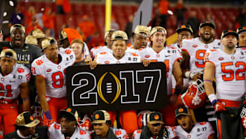 TAMPA, FL - JANUARY 09: The Clemson Tigers celebrate during the trophy presentation at the conclusion of the National Championship game against the Alabama Crimson Tide on January 9, 2017, at Raymond James Stadium in Tampa, FL. Clemson beat Alabama 35-31. (Photo by Todd Kirkland/Icon Sportswire via Getty Images)