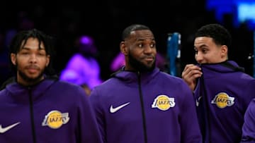 LOS ANGELES, CA - OCTOBER 20: LeBron James #23 of the Los Angeles Lakers makes his home debut with Brandon Ingram #14 and Kyle Kuzma #0 of the Los Angeles Lakers looking on against the Houston Rockets at Staples Center on October 20, 2018 in Los Angeles, California. NOTE TO USER: User expressly acknowledges and agrees that, by downloading and or using this photograph, User is consenting to the terms and conditions of the Getty Images License Agreement. (Photo by Kevork Djansezian/Getty Images)