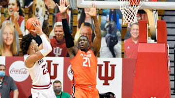 Feb 2, 2021; Bloomington, Indiana, USA; Illinois Fighting Illini center Kofi Cockburn (21) attempts to block a shot by Indiana Hoosiers forward Trayce Jackson-Davis (23) during the second half at Simon Skjodt Assembly Hall. Mandatory Credit: Marc Lebryk-USA TODAY Sports