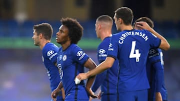 LONDON, ENGLAND - JULY 04: Willian of Chelsea celebrates with teammates after scoring his team's second goal during the Premier League match between Chelsea FC and Watford FC at Stamford Bridge on July 04, 2020 in London, England. Football Stadiums around Europe remain empty due to the Coronavirus Pandemic as Government social distancing laws prohibit fans inside venues resulting in all fixtures being played behind closed doors. (Photo by Mike Hewitt/Getty Images)