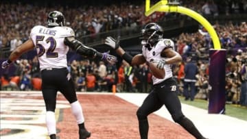 Feb 3, 2013; New Orleans, LA, USA; Baltimore Ravens safety Ed Reed (20) celebrates with linebacker Ray Lewis (52) after defeating the San Francisco 49ers 34-31 in Super Bowl XLVII at the Mercedes-Benz Superdome.Mandatory Credit: Matthew Emmons-USA TODAY Sports