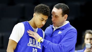 Mar 16, 2016; Providence , RI, USA; Duke head coach Mike Krzyzewski talks with Derryck Thornton (12) during practice a day before the first round of the NCAA men