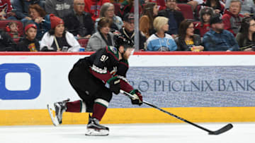 GLENDALE, ARIZONA - JANUARY 12: Taylor Hall #91 of the Arizona Coyotes skates the puck up ice against the Pittsburgh Penguins at Gila River Arena on January 12, 2020 in Glendale, Arizona. (Photo by Norm Hall/NHLI via Getty Images)