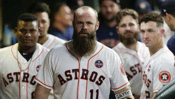 HOUSTON, TX - SEPTEMBER 05: Evan Gattis #11 of the Houston Astros celebrates his two-run home run in the fourth inning against the Minnesota Twins with his teammates in the dugout at Minute Maid Park on September 5, 2018 in Houston, Texas. (Photo by Bob Levey/Getty Images)