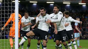 BURNLEY, ENGLAND - JANUARY 01: Dejan Lovren of Liverpool and Emre Can of Liverpool celebrate there sides second goal of the game during the Premier League match between Burnley and Liverpool at Turf Moor on January 1, 2018 in Burnley, England. (Photo by Nigel Roddis/Getty Images)