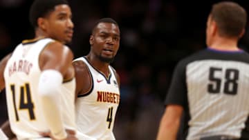 DENVER, CO - OCTOBER 05: Paul Milsap #4 of the Denver Nuggets excahnges words with referee Joshua Tiven #58 as he is ejected while playing the Perth Wildcats at the Pepsi Center on October 5, 2018 in Denver, Colorado. NOTE TO USER: User expressly acknowledges and agrees that, by downloading and or using this photograph, User is consenting to the terms and conditions of the Getty Images License Agreement. (Photo by Matthew Stockman/Getty Images)