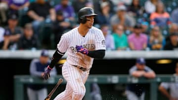DENVER, CO - SEPTEMBER 17: Carlos Gonzalez (Photo by Russell Lansford/Getty Images)