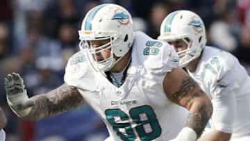 Oct 27, 2013; Foxborough, MA, USA; Miami Dolphins guard Richie Incognito (68) prepares to block against the New England Patriots during the second quarter at Gillette Stadium. Mandatory Credit: Winslow Townson-USA TODAY Sports
