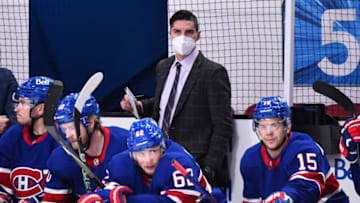 MONTREAL, QC - MARCH 04: Assistant coach of the Montreal Canadiens Alex Burrows looks on from behind the bench against the Winnipeg Jets during the first period at the Bell Centre on March 4, 2021 in Montreal, Canada. The Winnipeg Jets defeated the Montreal Canadiens 4-3 in overtime. (Photo by Minas Panagiotakis/Getty Images)