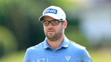 ORLANDO, FLORIDA - MARCH 04: Corey Conners of Canada looks on as he walks off the 17th green during the first round of the Arnold Palmer Invitational Presented by MasterCard at the Bay Hill Club and Lodge on March 04, 2021 in Orlando, Florida. (Photo by Sam Greenwood/Getty Images)