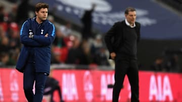 LONDON, ENGLAND - OCTOBER 25: Mauricio Pochettino, Manager of Tottenham Hotspur and Slaven Bilic, Manager of West Ham United look on during the Carabao Cup Fourth Round match between Tottenham Hotspur and West Ham United at Wembley Stadium on October 25, 2017 in London, England. (Photo by Michael Regan/Getty Images)