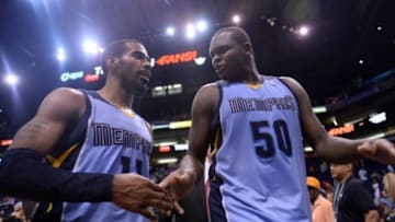 Apr 14, 2014; Phoenix, AZ, USA; Memphis Grizzlies forward Zach Randolph (50) and guard Mike Conley (11) celebrate after defeating the Phoenix Suns at US Airways Center. The Grizzlies won 97-91. Mandatory Credit: Joe Camporeale-USA TODAY Sports