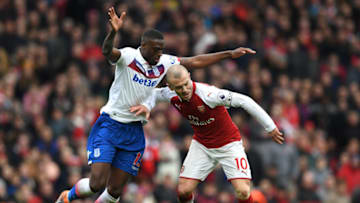 LONDON, ENGLAND - APRIL 01: Jack Wilshere of Arsenal is challenged by Bruno Martins Indi of Stoke City during the Premier League match between Arsenal and Stoke City at Emirates Stadium on April 1, 2018 in London, England. (Photo by Shaun Botterill/Getty Images)
