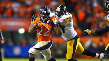 Jan 17, 2016; Denver, CO, USA; Denver Broncos running back C.J. Anderson (22) is tackled by Pittsburgh Steelers inside linebacker Lawrence Timmons (94) during the fourth quarter of the AFC Divisional round playoff game at Sports Authority Field at Mile High. Mandatory Credit: Mark J. Rebilas-USA TODAY Sports