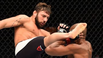 GLASGOW, SCOTLAND - JULY 18: (L-R) Jimmie Rivera of the United States kicks Marcus Brimage of the United States in their bantamweight fight during the UFC Fight Night event inside the SSE Hydro on July 18, 2015 in Glasgow, Scotland. (Photo by Josh Hedges/Zuffa LLC/Zuffa LLC via Getty Images)