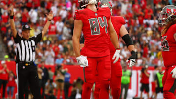 TAMPA, FLORIDA - DECEMBER 09: Cameron Brate #84 of the Tampa Bay Buccaneers celebrates after scoring a touchdown in the second quarter against the New Orleans Saints at Raymond James Stadium on December 09, 2018 in Tampa, Florida. (Photo by Will Vragovic/Getty Images)