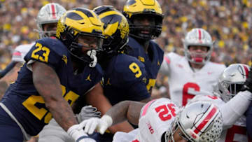 Nov. 25, 2023; Ann Arbor, Mi., USA;Ohio State Buckeyes running back TreVeyon Henderson (32) falls into the end zone for a touchdown during the second half of Saturday's NCAA Division I football game against the Michigan Wolverines at Michigan Stadium.