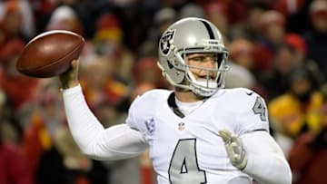 Dec 8, 2016; Kansas City, MO, USA; Oakland Raiders quarterback Derek Carr (4) passes against the Kansas City Chiefs during a NFL football game at Arrowhead Stadium. Mandatory Credit: Kirby Lee-USA TODAY Sports